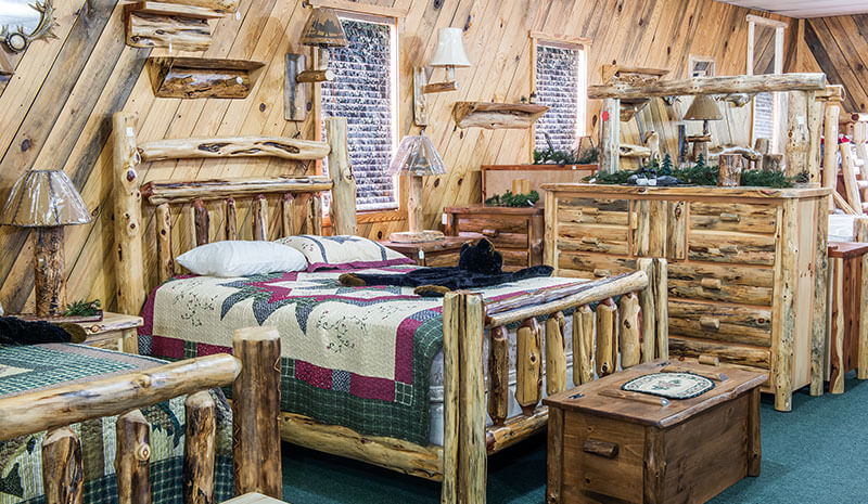 Dutchman Log Furniture Showroom Rustic Bed and Dresser